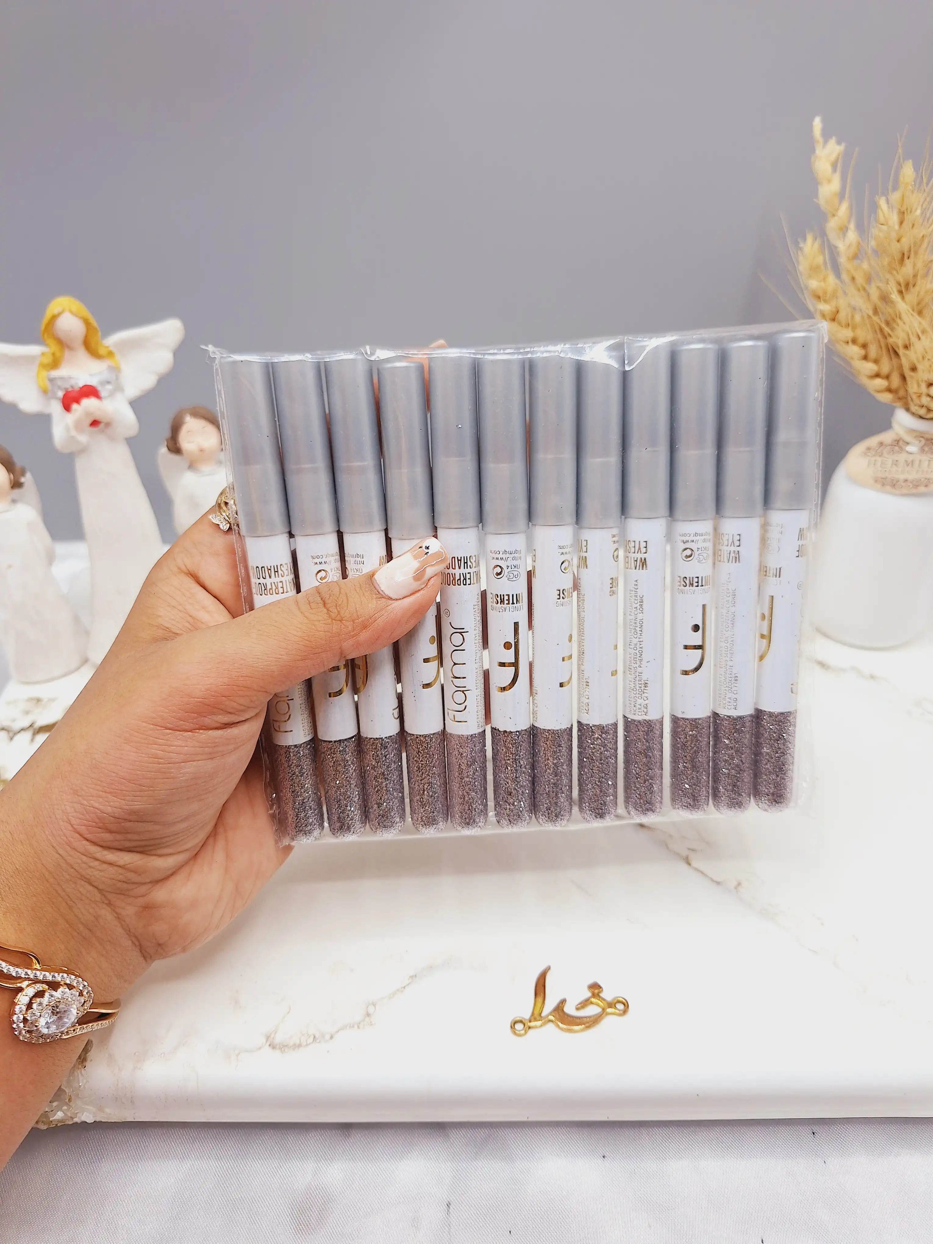 مداد چشم گلیتری رنگ نقره ای برند فلورمار flormar