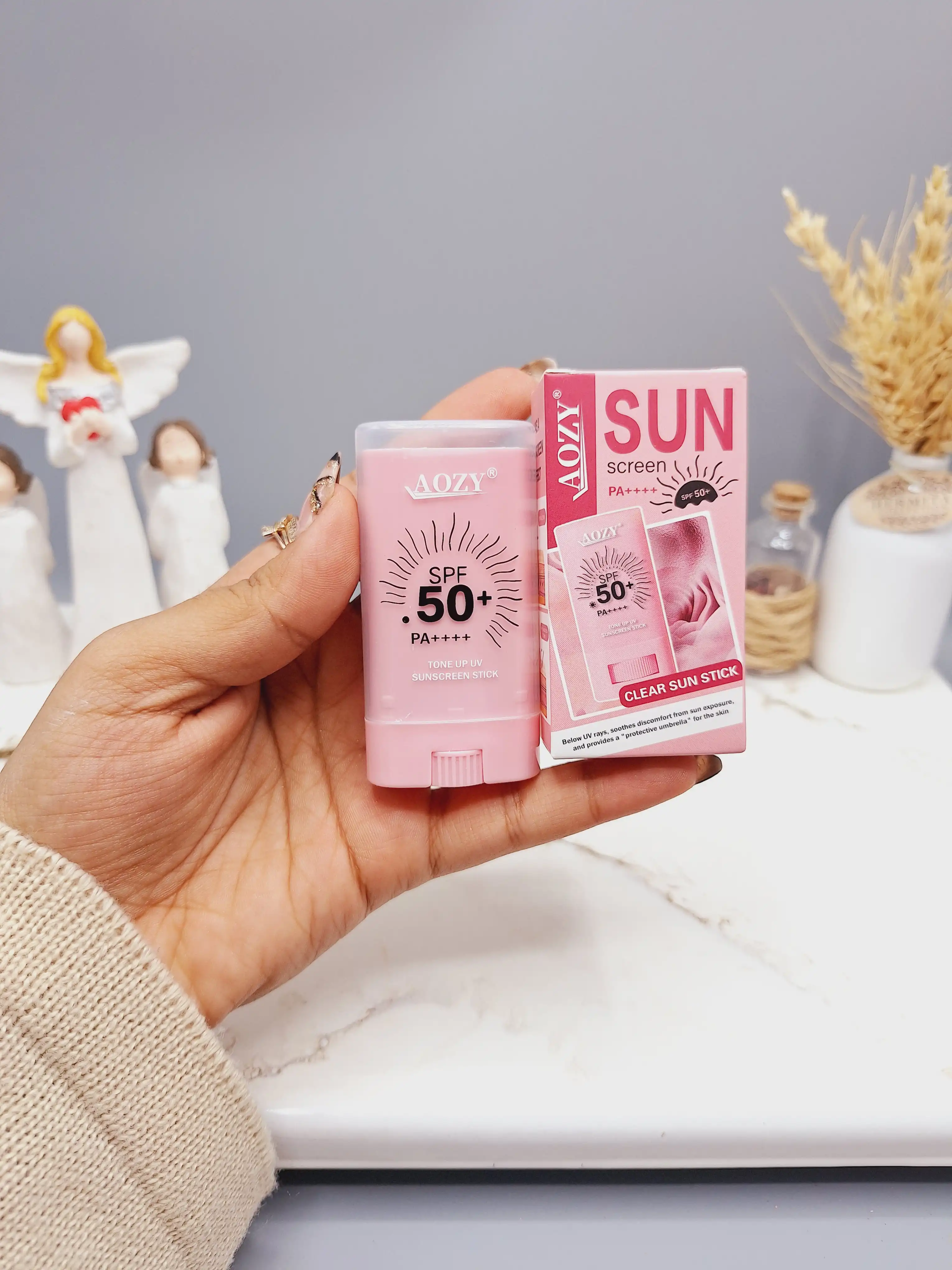 ضد آفتاب بی رنگ استیکی SPF 50 مناسب در برابر آفتاب با رایحه گل کد AB008